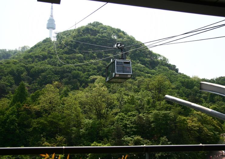 Take the cable car up Mount Namsan